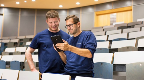 staff-smiling-checking-tablet.jpg (73.7 KB)